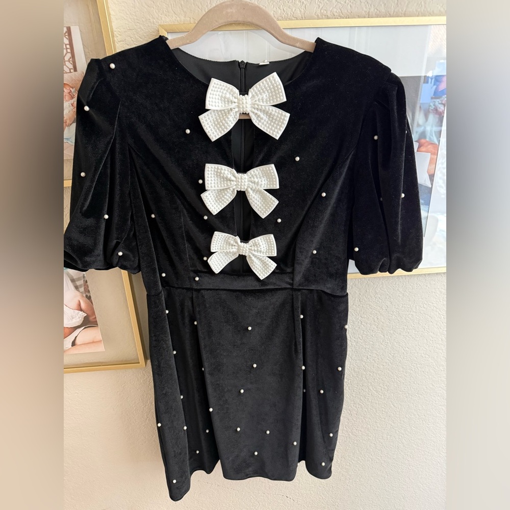 Elegant Black Dress with Pearl Bow Accents